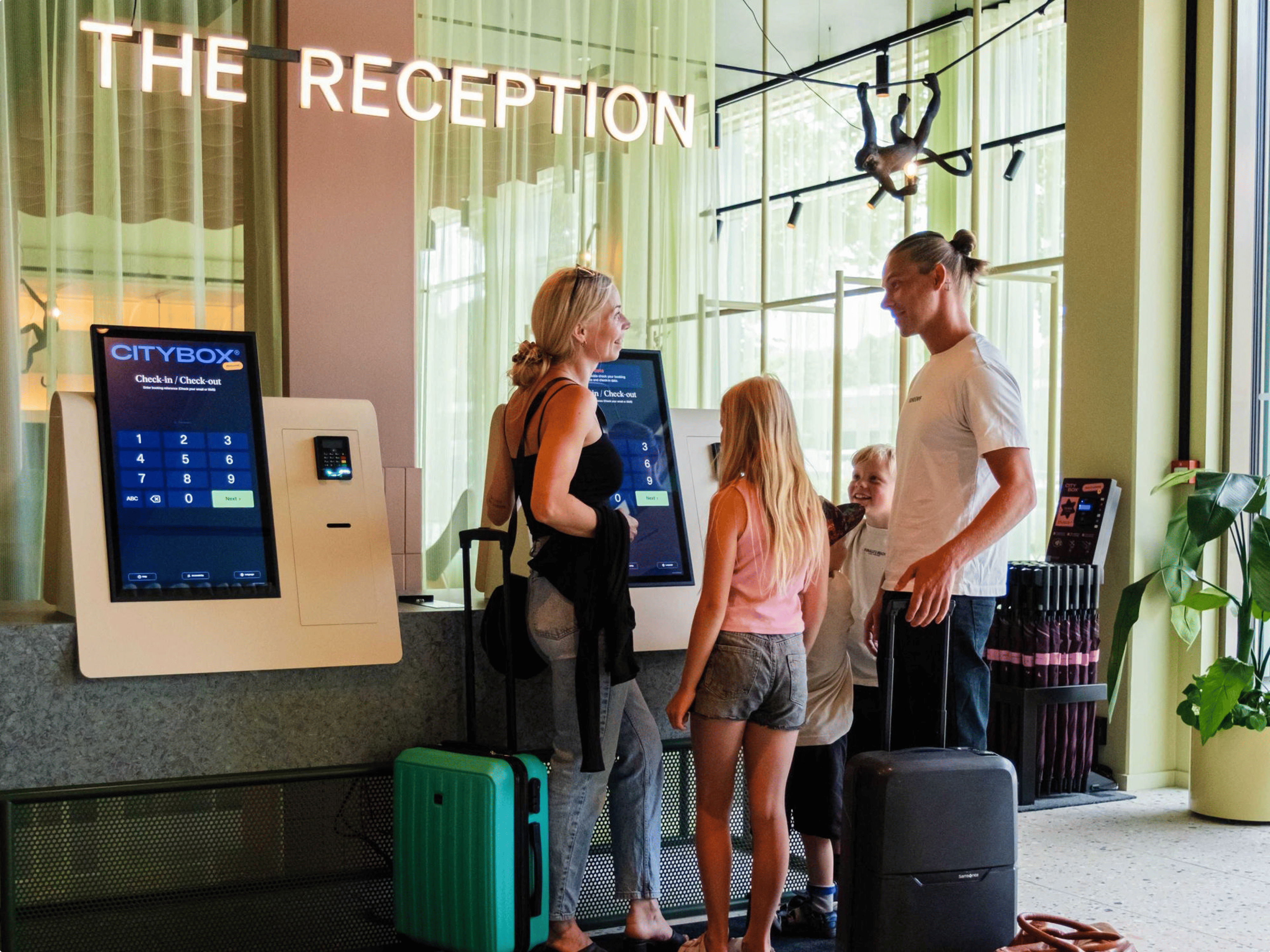 Family using a Citybox self-service kiosk at The Reception. Credit: Markus Gjengaar, Citybox.